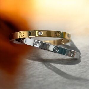 2 ELEGANT GOLD AND SILVER ALTERNATING ZIRCON+CROSS DESIGNS BRACELET DUET